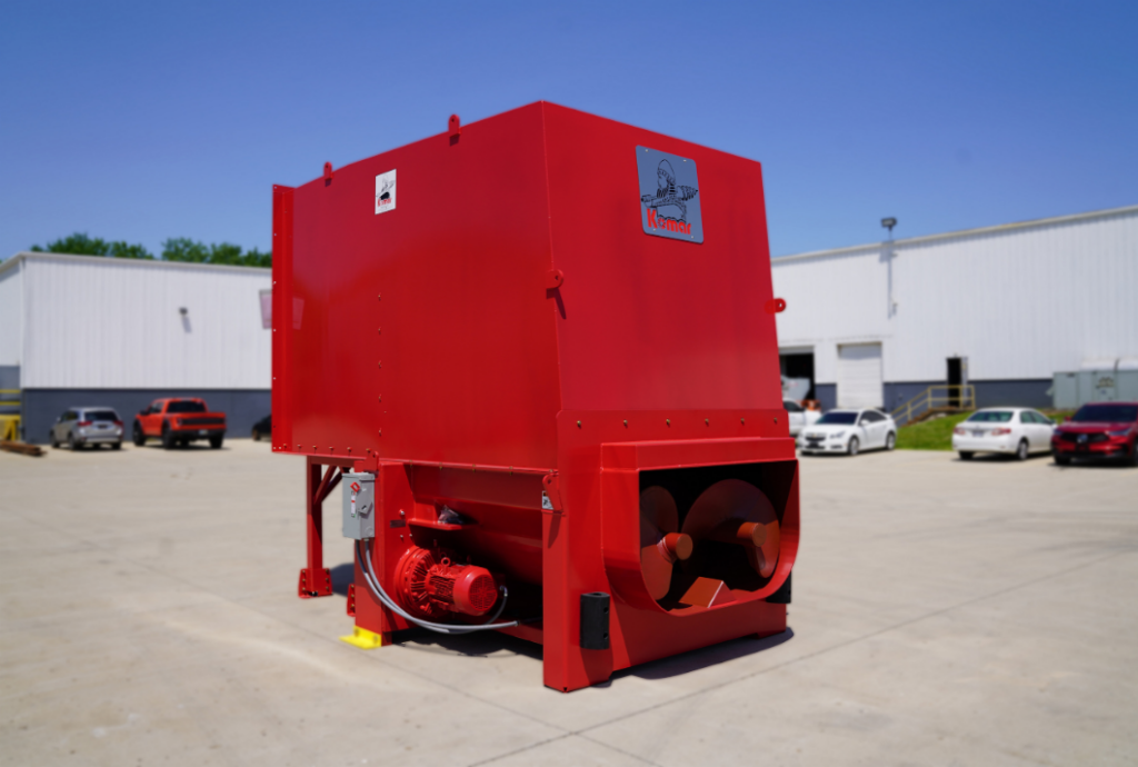 Komar auger compactor