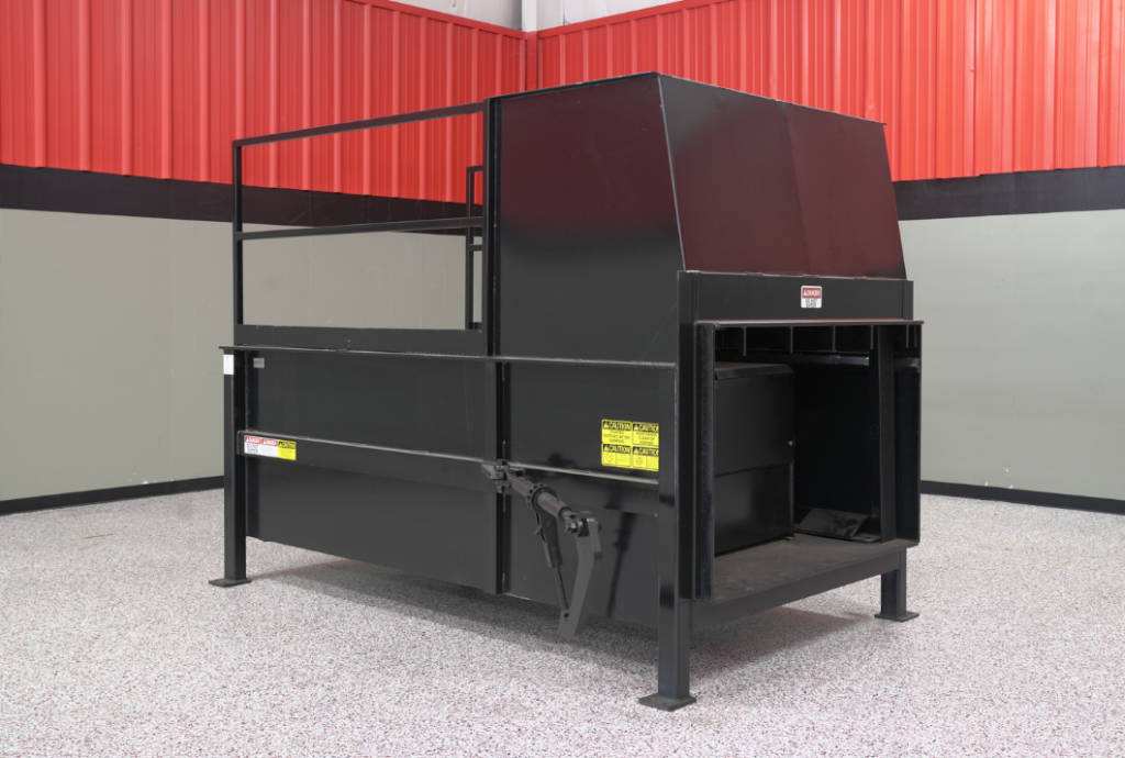 Komar stationary compactor
