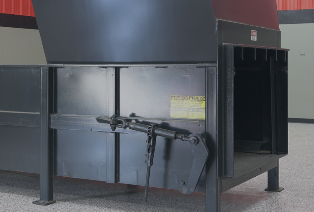 Komar stationary compactor